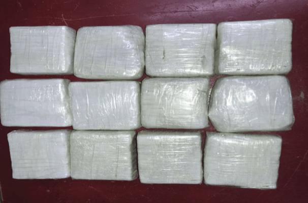 Five in custody after cocaine found strapped to bottom of vehicle at CJIA