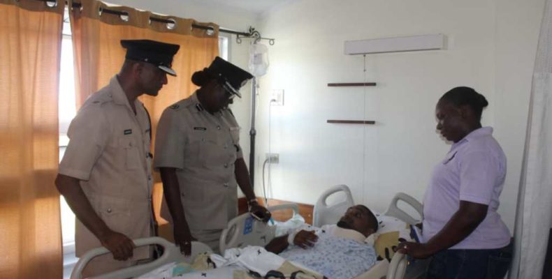 Cop hospitalised after crashing into fence