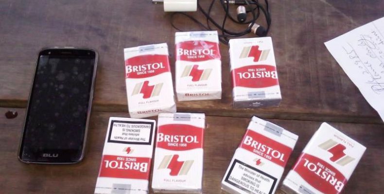 Police rank arrested after attempting to smuggle contraband into Lusignan Prison