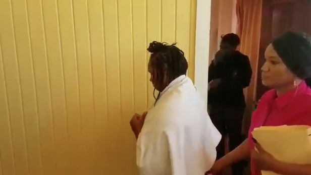 Tearful Plaisance woman remanded to jail over murder of reputed husband