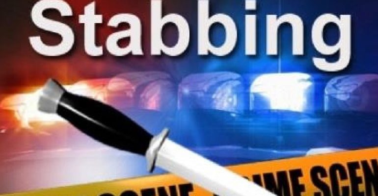 Man on the run after stabbing wife, lover