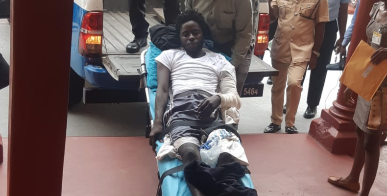 Injured alleged gang member fetched into Court to face attempted murder charge