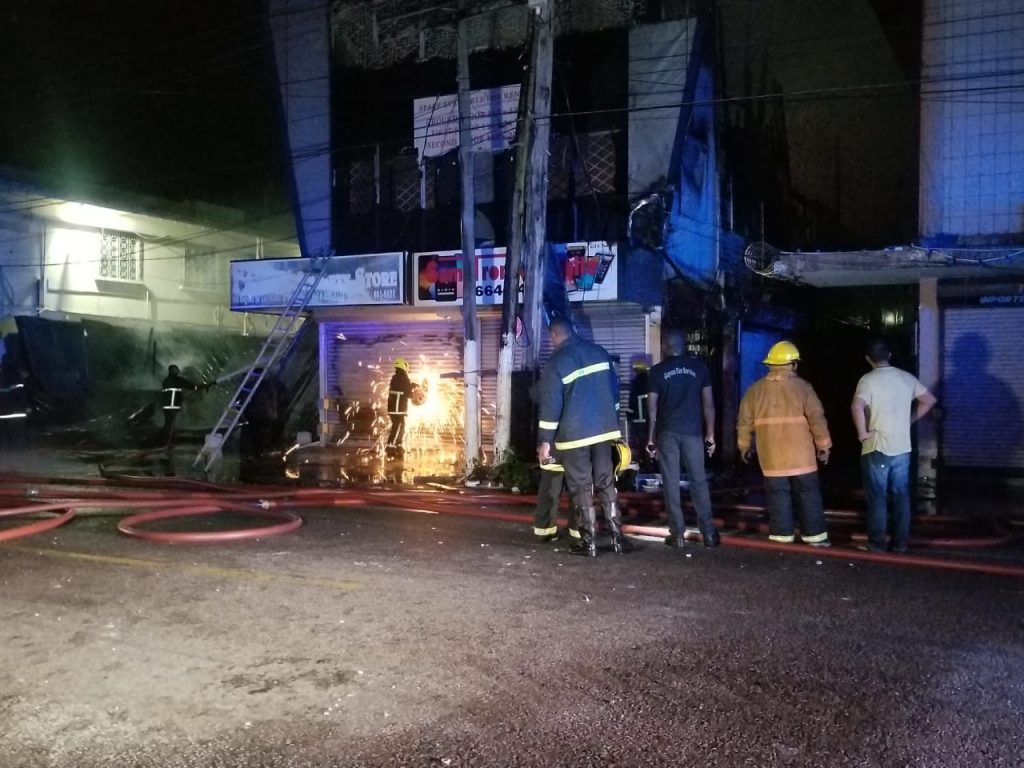 Response of Fire Service to city fire hampered by garbage-covered hydrant