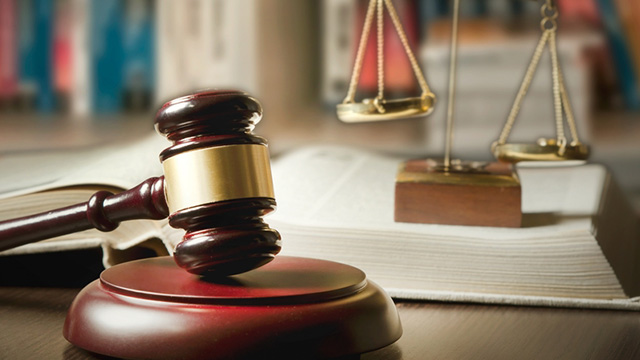 Father remanded to jail for harboring prison escapee son and others