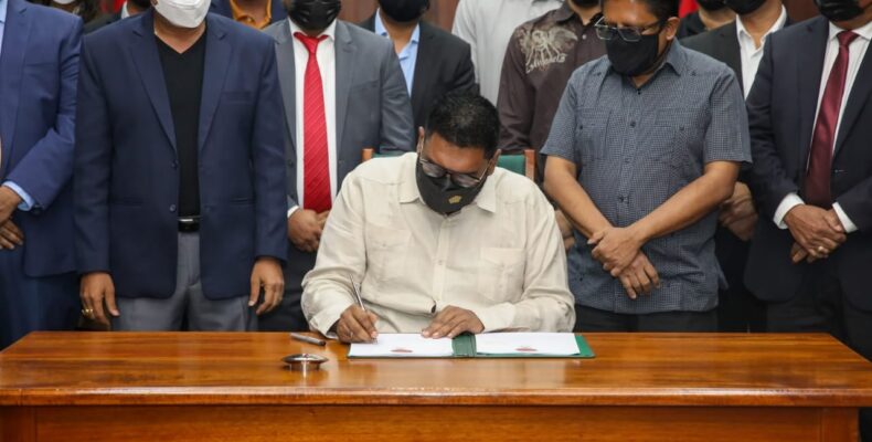 President signs Natural Resource Fund and Local Content Bills into law
