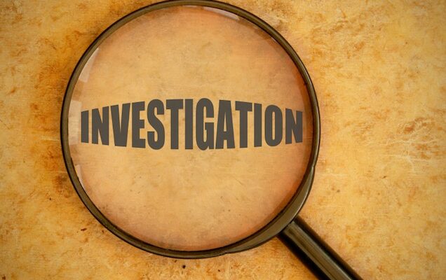 Man arrested, police seek prominent lawyer in alleged cover-up in murder probe