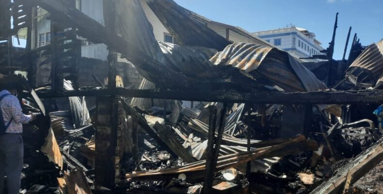 Several homeless after unattended candle destroys apartment building