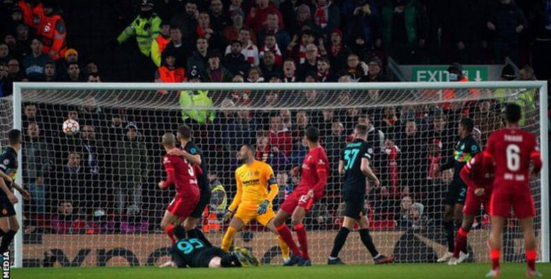 Beaten Liverpool hold on to reach Champions League quarter-finals