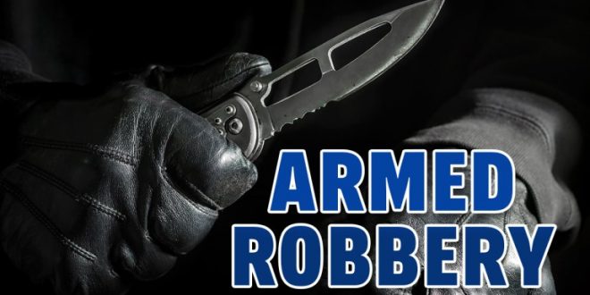 Taxi driver robbed at knifepoint while waiting on passenger
