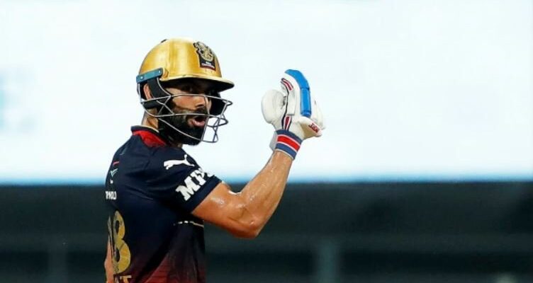 Kohli hits 73 as RCB beat Titans to stay alive